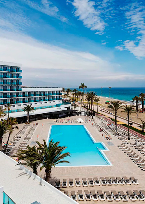 hotel pool by the beach